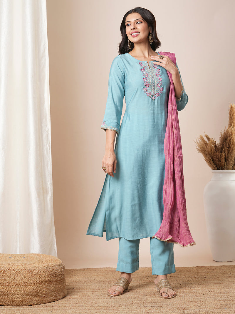 Embroidered straight fit silk blend kurta paired with lined pants and crushed dupatta.