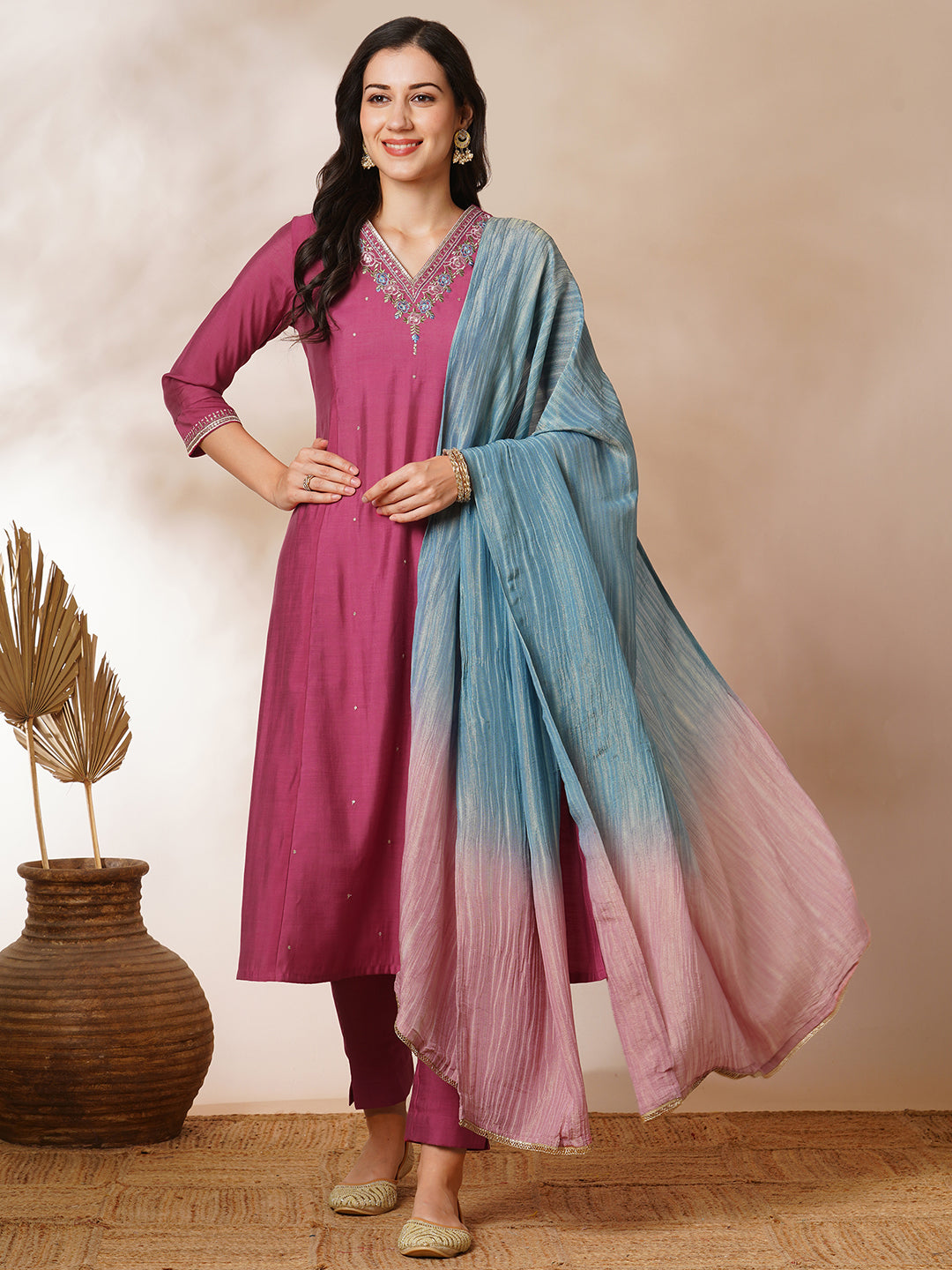 Party Edit- A-line kurta in silk blend fabric with embroidery detailing paired with lined silk blend pants and shaded tissue dupatta