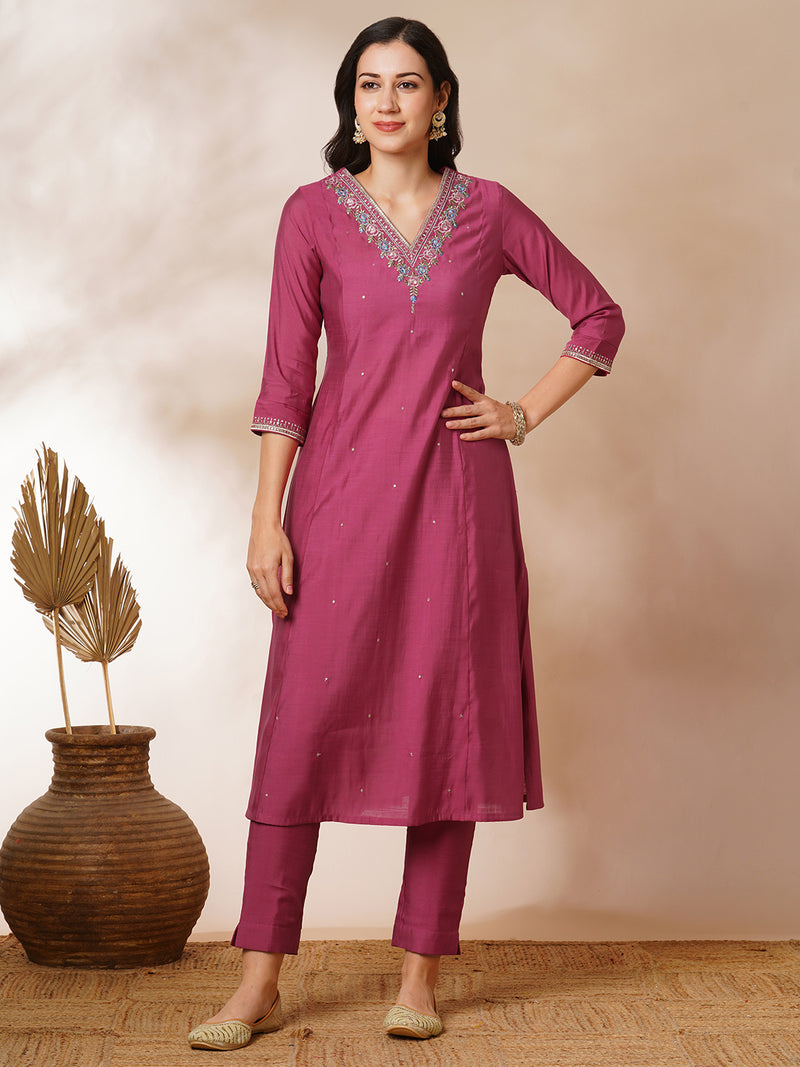 Tasya - A-line kurta in silk blend fabric with embroidery detailing paired with lined silk blend pants and shaded tissue dupatta.