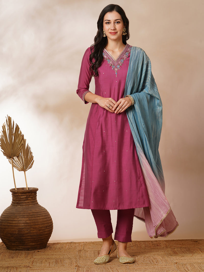 Tasya - A-line kurta in silk blend fabric with embroidery detailing paired with lined silk blend pants and shaded tissue dupatta.