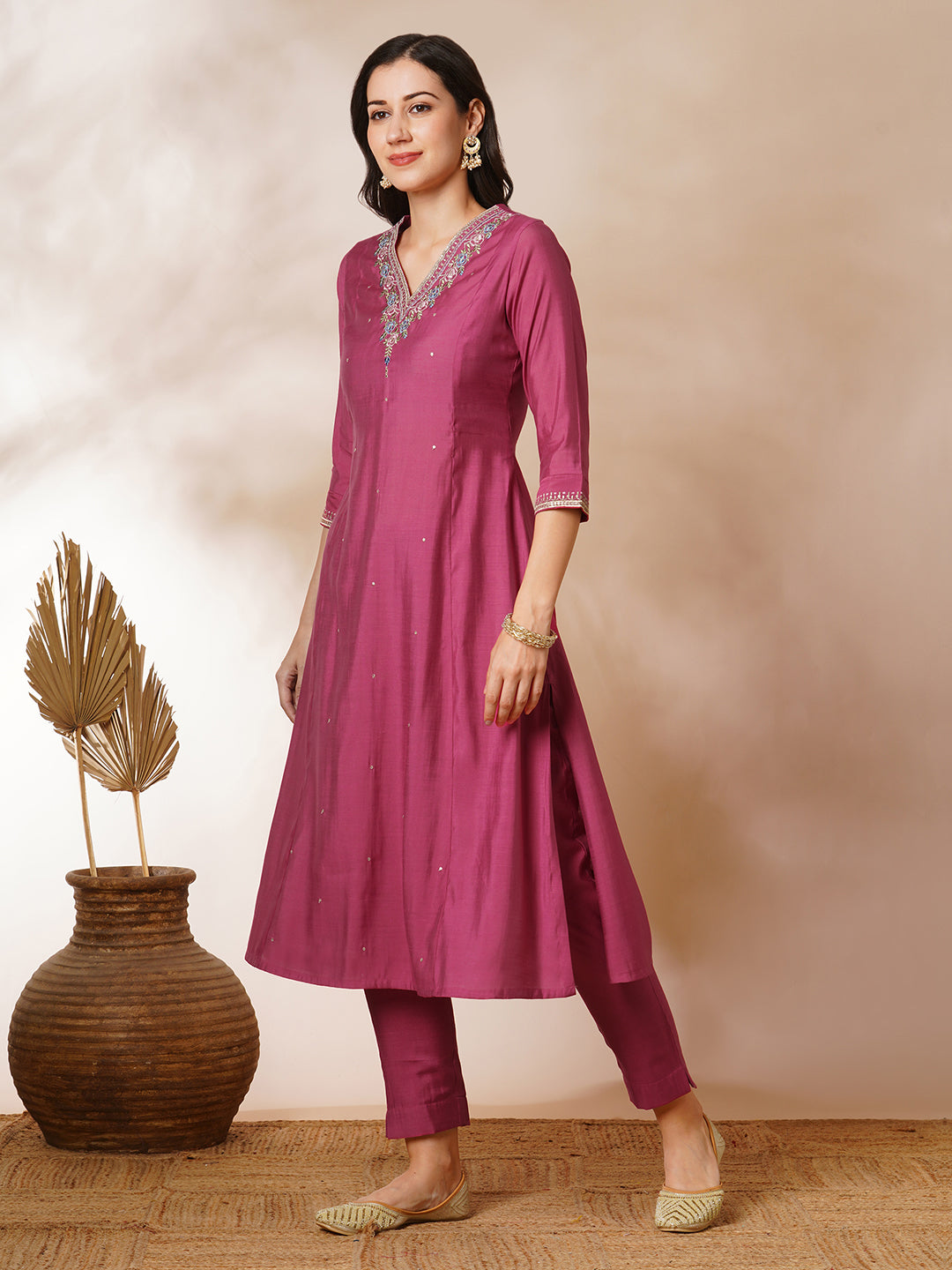 Party Edit- A-line kurta in silk blend fabric with embroidery detailing paired with lined silk blend pants and shaded tissue dupatta