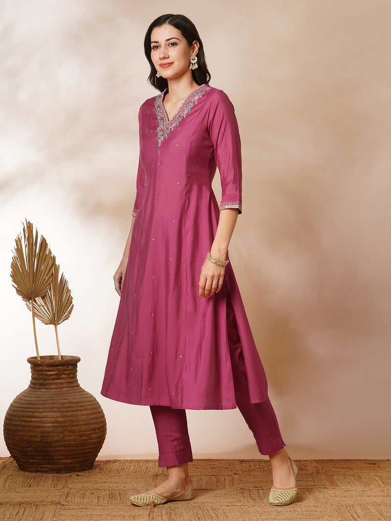 Tasya - A-line kurta in silk blend fabric with embroidery detailing paired with lined silk blend pants and shaded tissue dupatta.