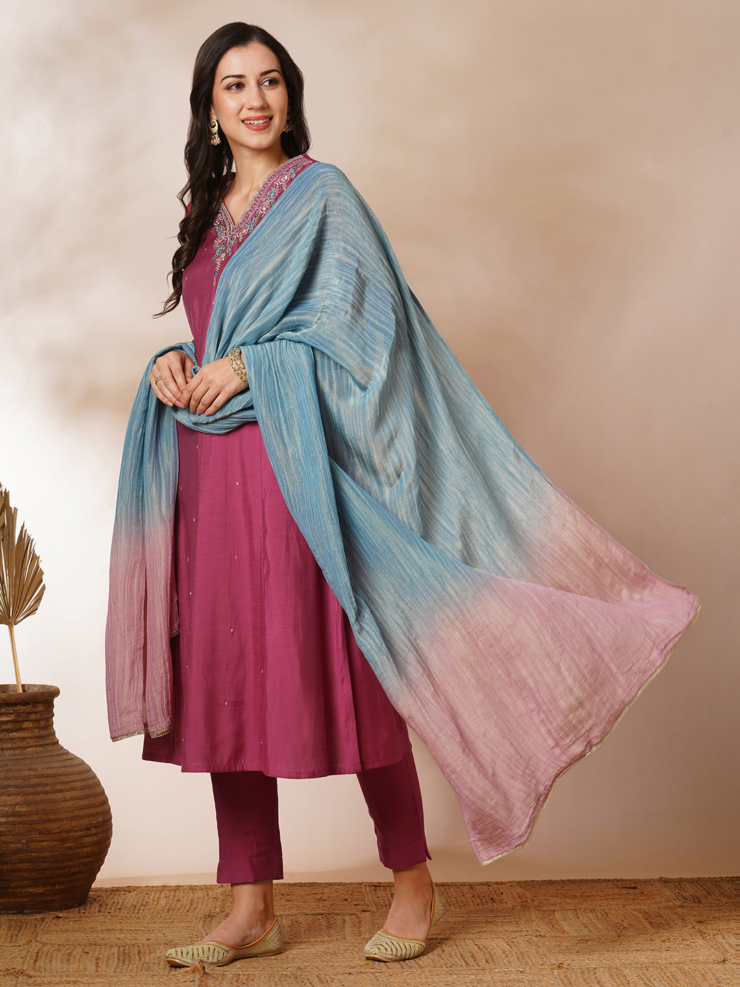 Party Edit- A-line kurta in silk blend fabric with embroidery detailing paired with lined silk blend pants and shaded tissue dupatta