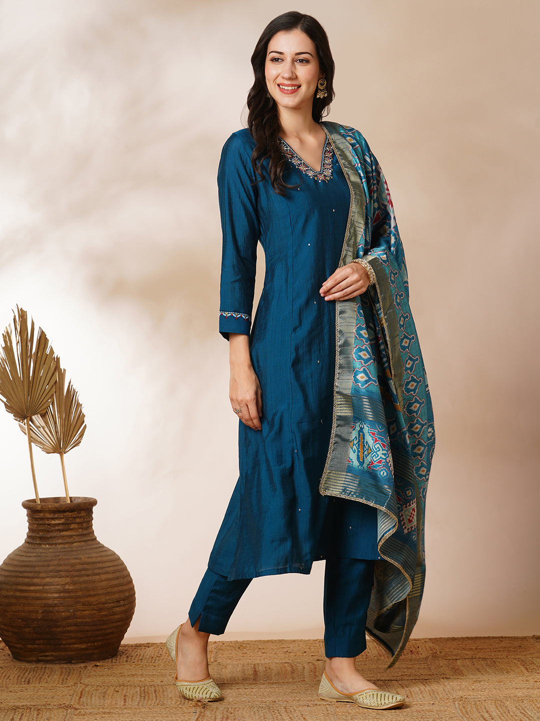 Party Edit- A-line silk blend kurta with zari embroidery detailing paired with printed dupatta and lined silk blend pants