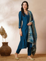 Tasya - A-line silk blend kurta with zari embroidery detailing paired with printed dupatta and lined silk blend pants.