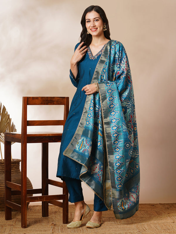 Tasya - A-line silk blend kurta with zari embroidery detailing paired with printed dupatta and lined silk blend pants.