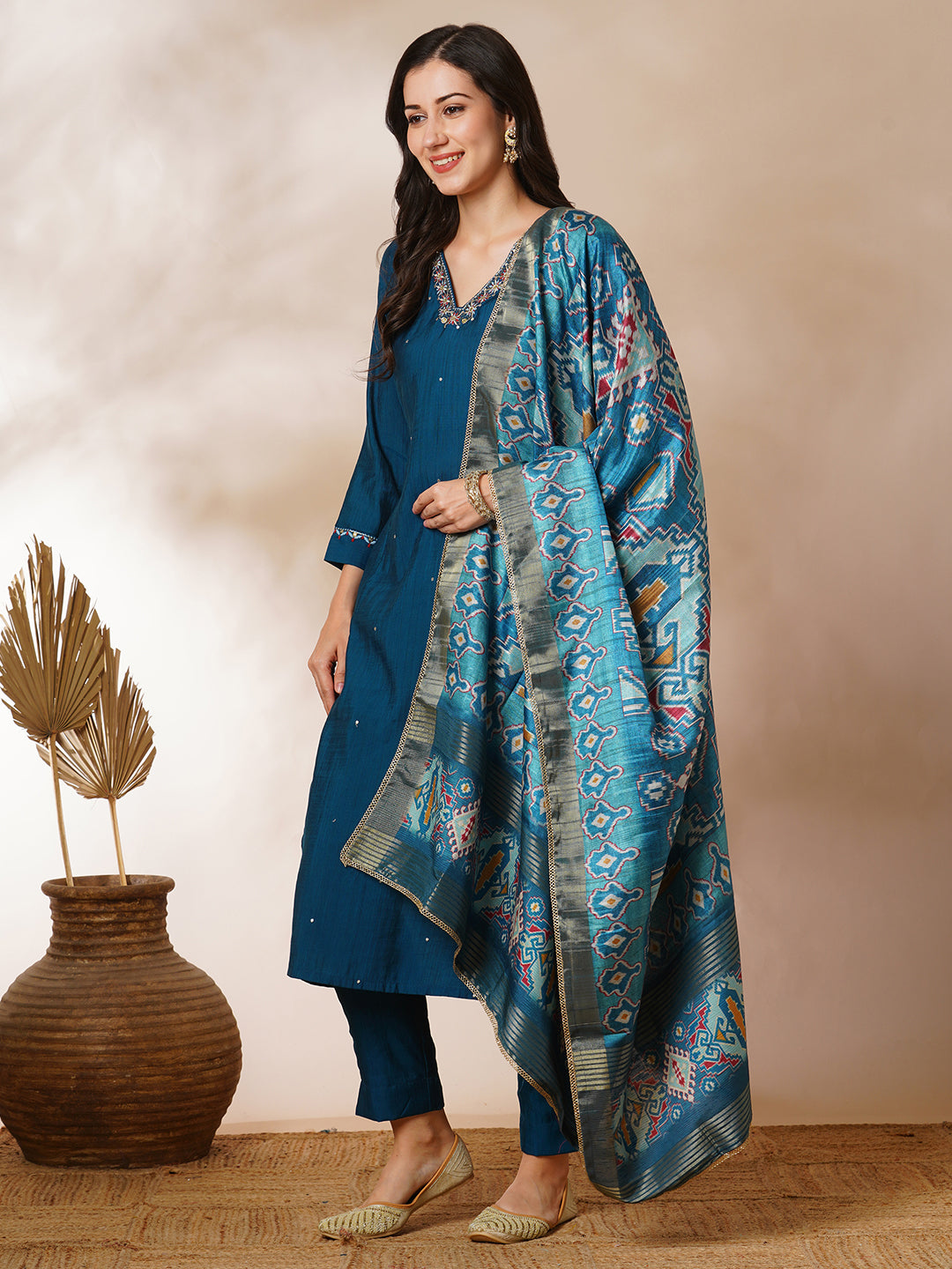 Party Edit- A-line silk blend kurta with zari embroidery detailing paired with printed dupatta and lined silk blend pants