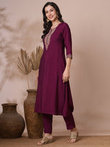 Embroidered A line silk blend kurta paired with printed dupatta and lined pants.