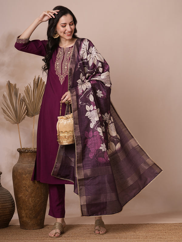 Embroidered A line silk blend kurta paired with printed dupatta and lined pants.