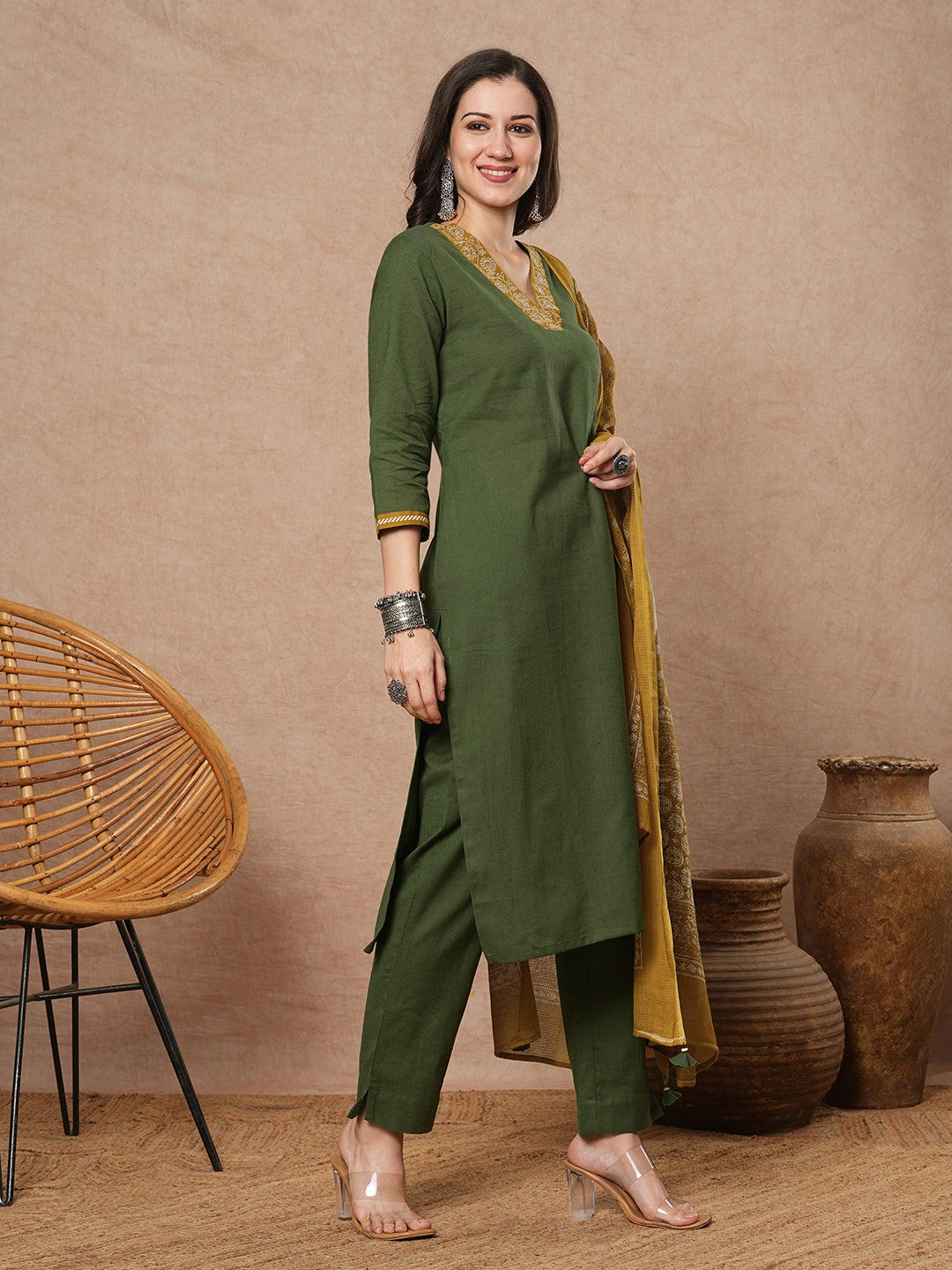 Green A-line kurta set with Embroidered V-neck with black printed dupatta and pant