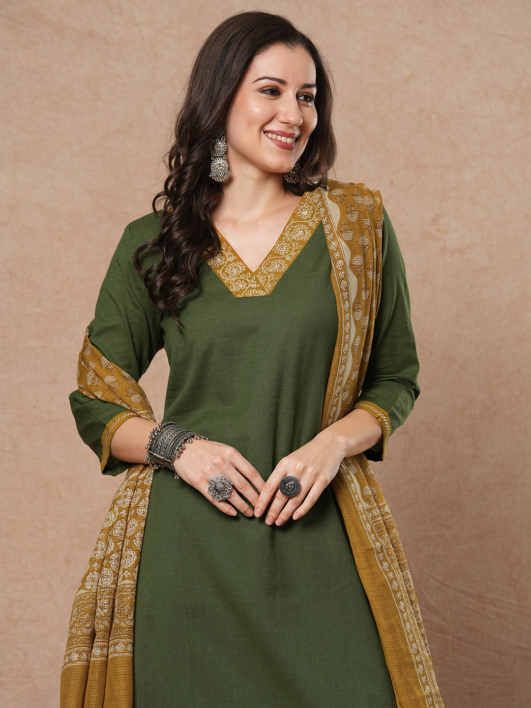 Green A-line kurta set with Embroidered V-neck with black printed dupatta and pant