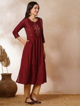 INAARA - A-line gathered silk blend kurta with zari embroidery and a side pocket.