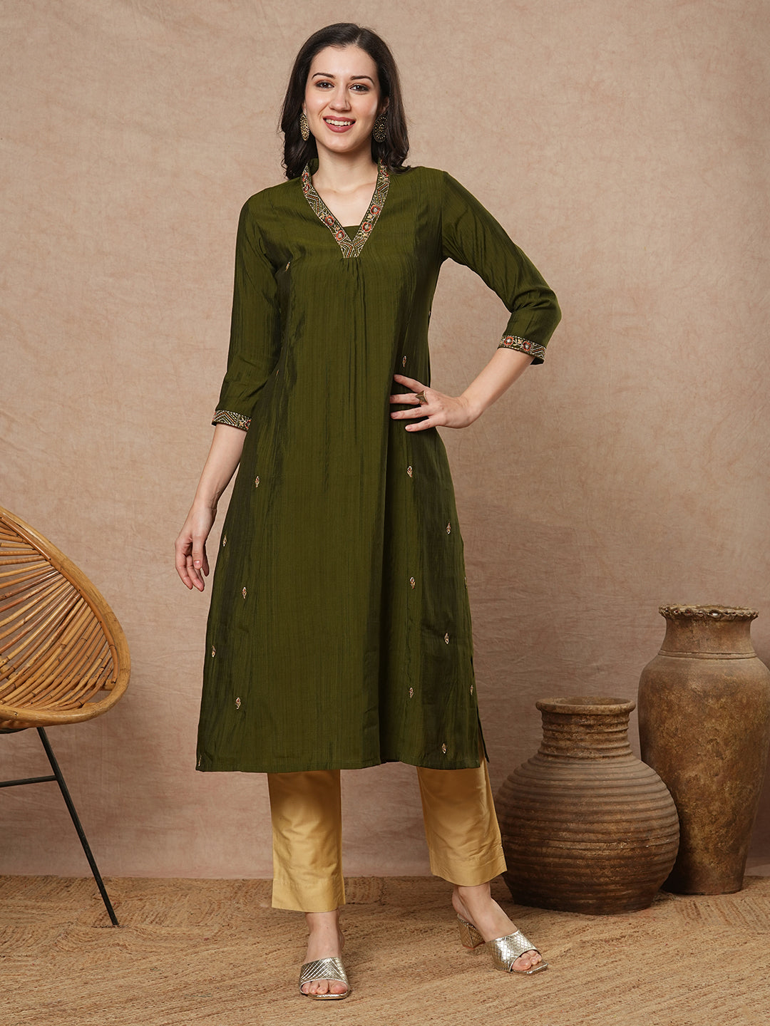 Party Edit- Pocketed a line kurta with embroidery and gathering detailing
