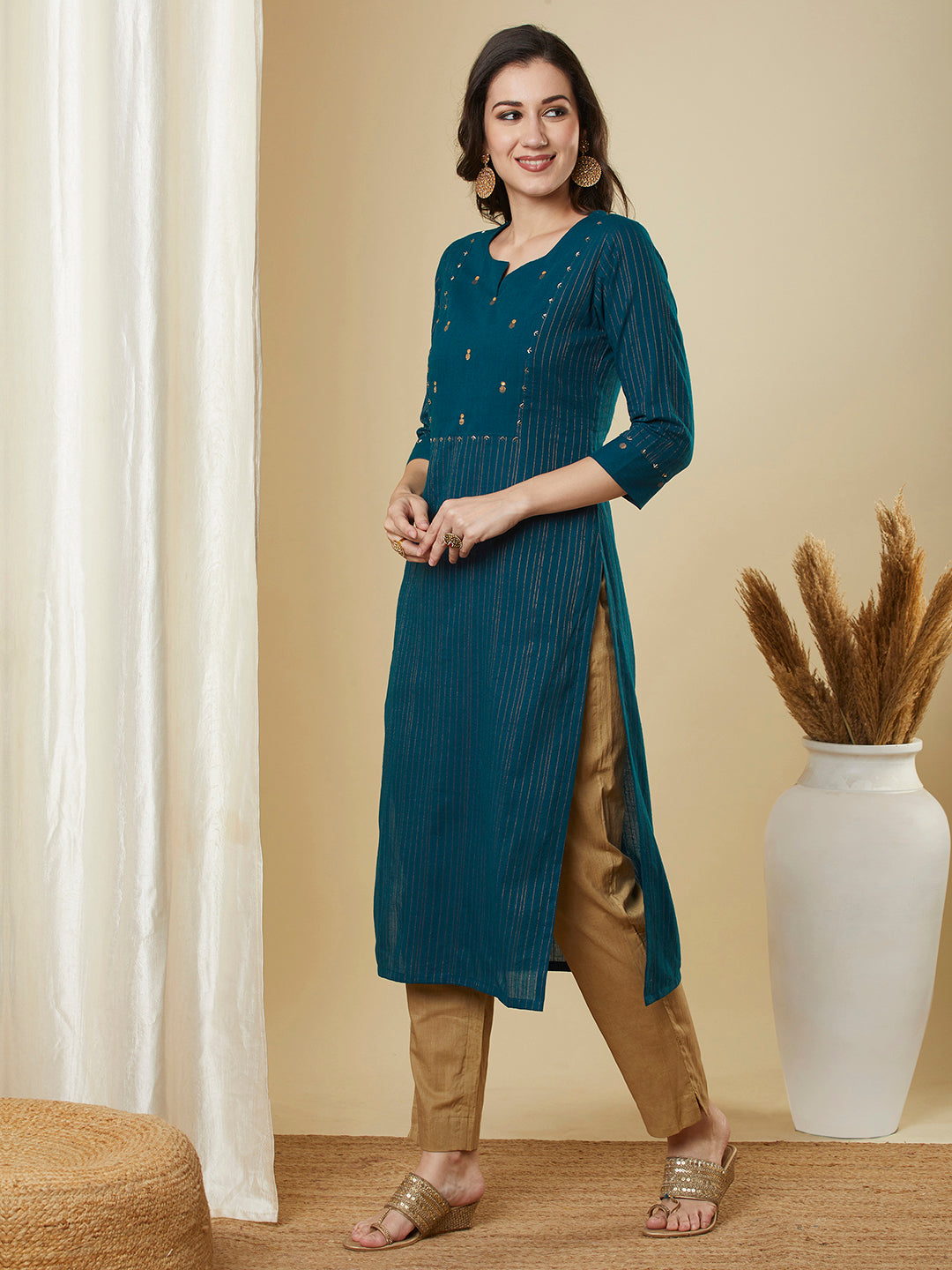 Straight fit cotton kurta in woven zari fabric with hand embroidery detailing
