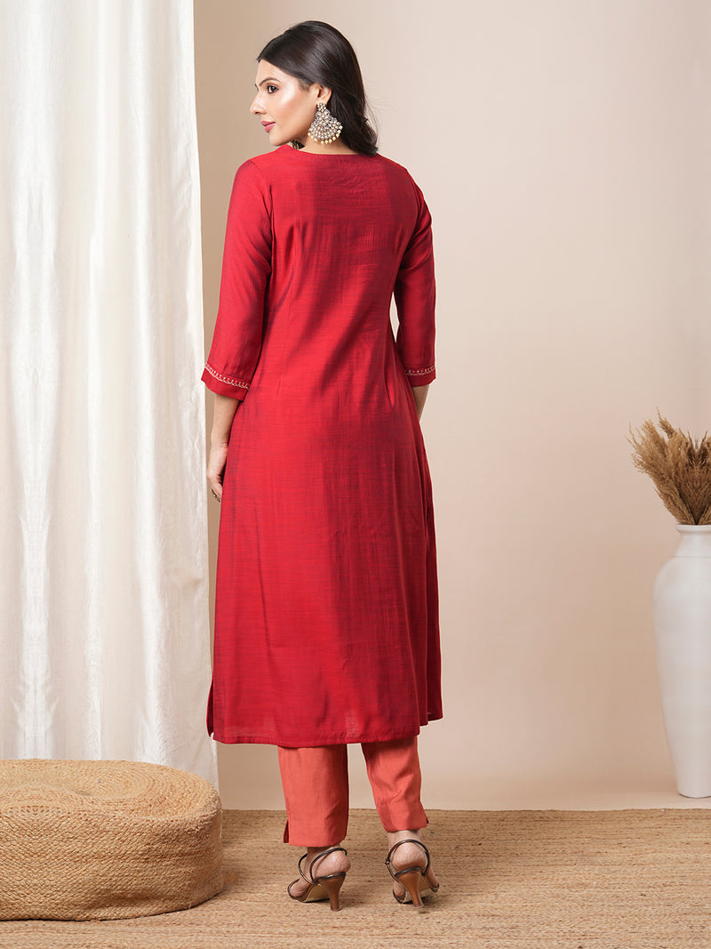 Flared avani silk kurta with a slit under the computer emboidred yoke.