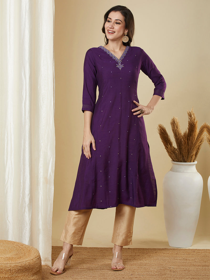 Purple flared kurta with monotonous & zari embroidery dots all over the surface.