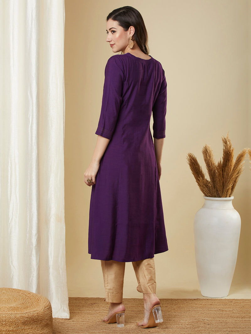 Purple flared kurta with monotonous & zari embroidery dots all over the surface.