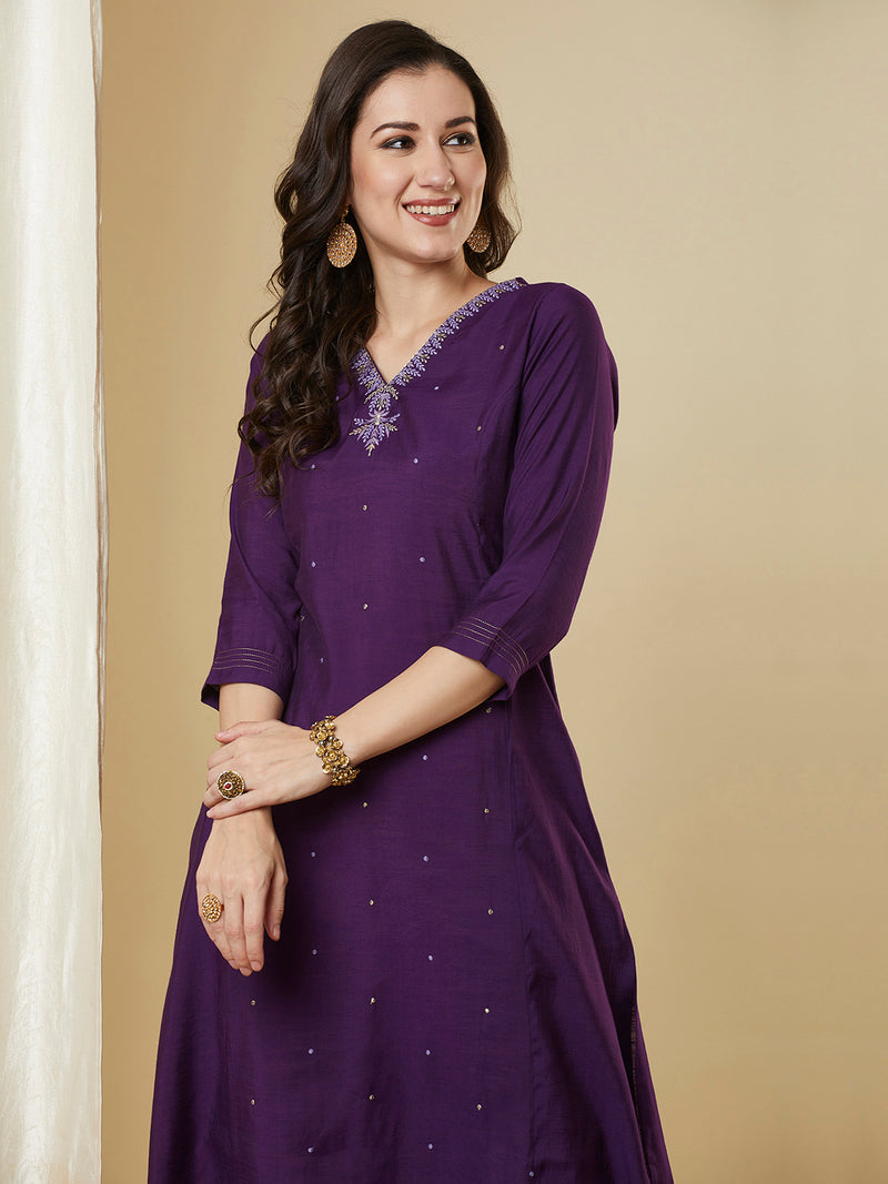 Purple flared kurta with monotonous & zari embroidery dots all over the surface.