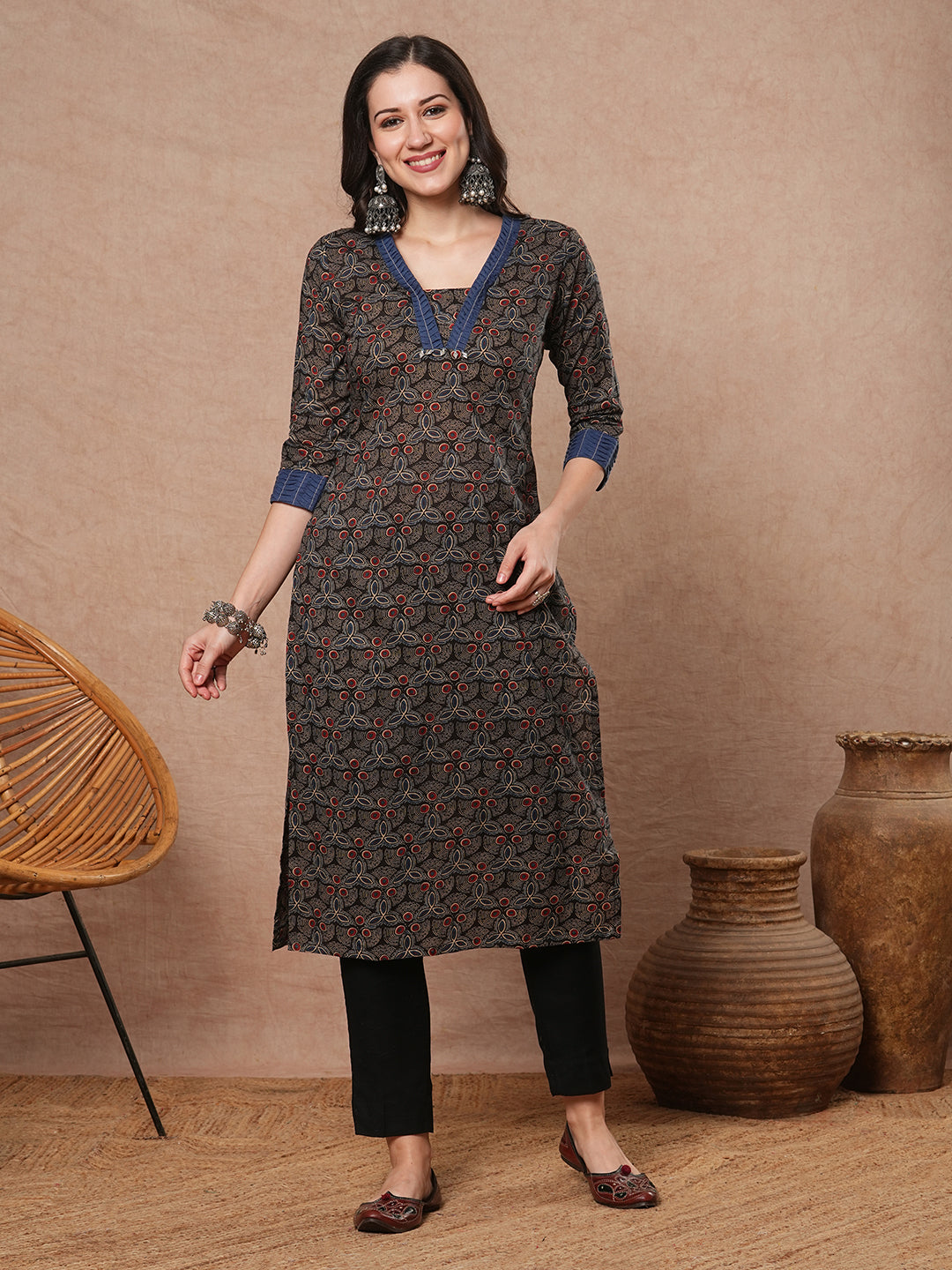 Straight fit printed kurta with contrast fabric smocking on neckline and cuff and silver trims