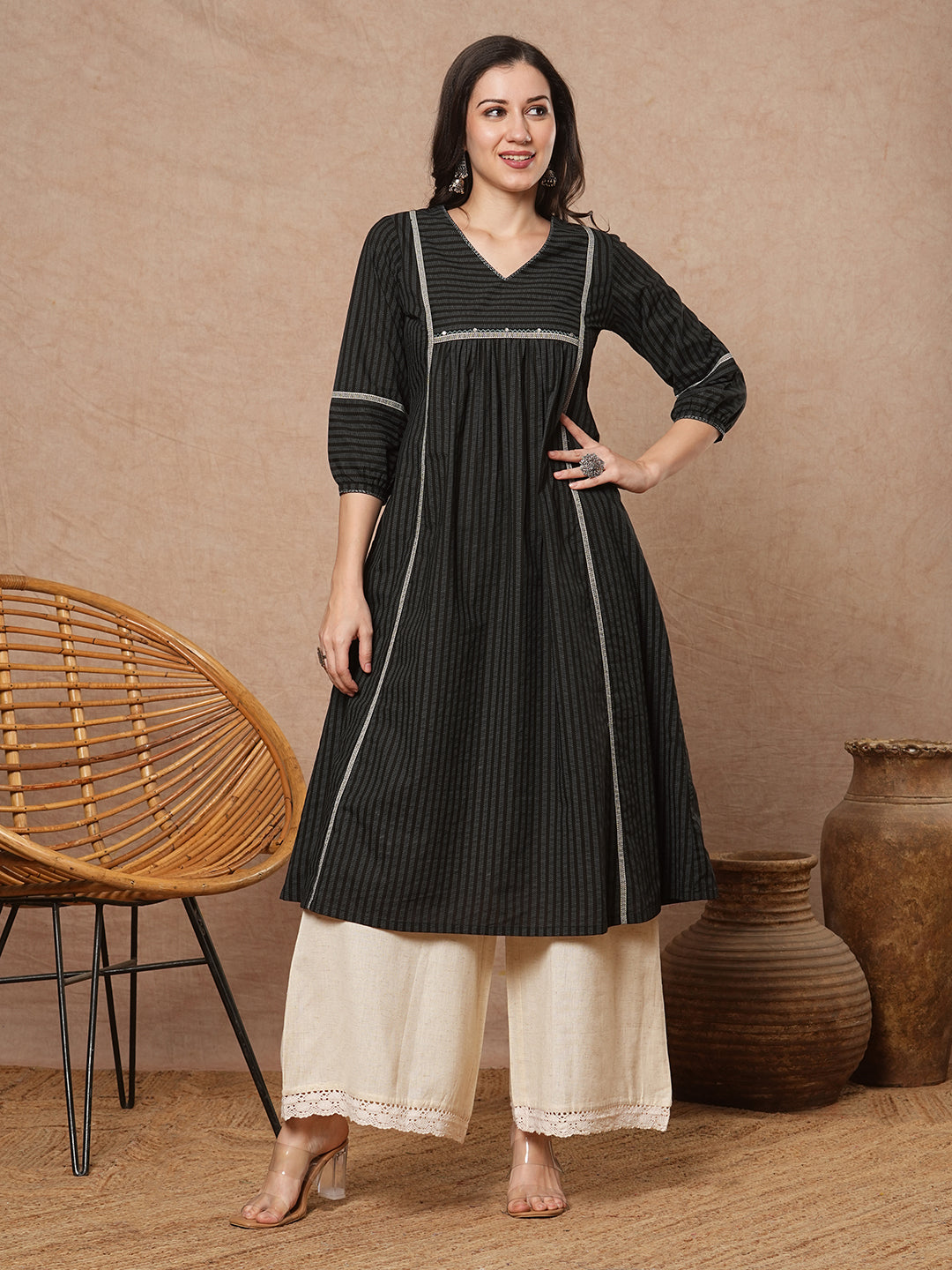 A-line shoulder princess kurta with under-bust gathers with contrast fabric trims and handwork