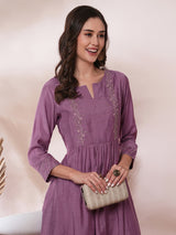 Inaara -Pocketed A line kurta adorned with zari embroidery and paired with lined silk blend pants.