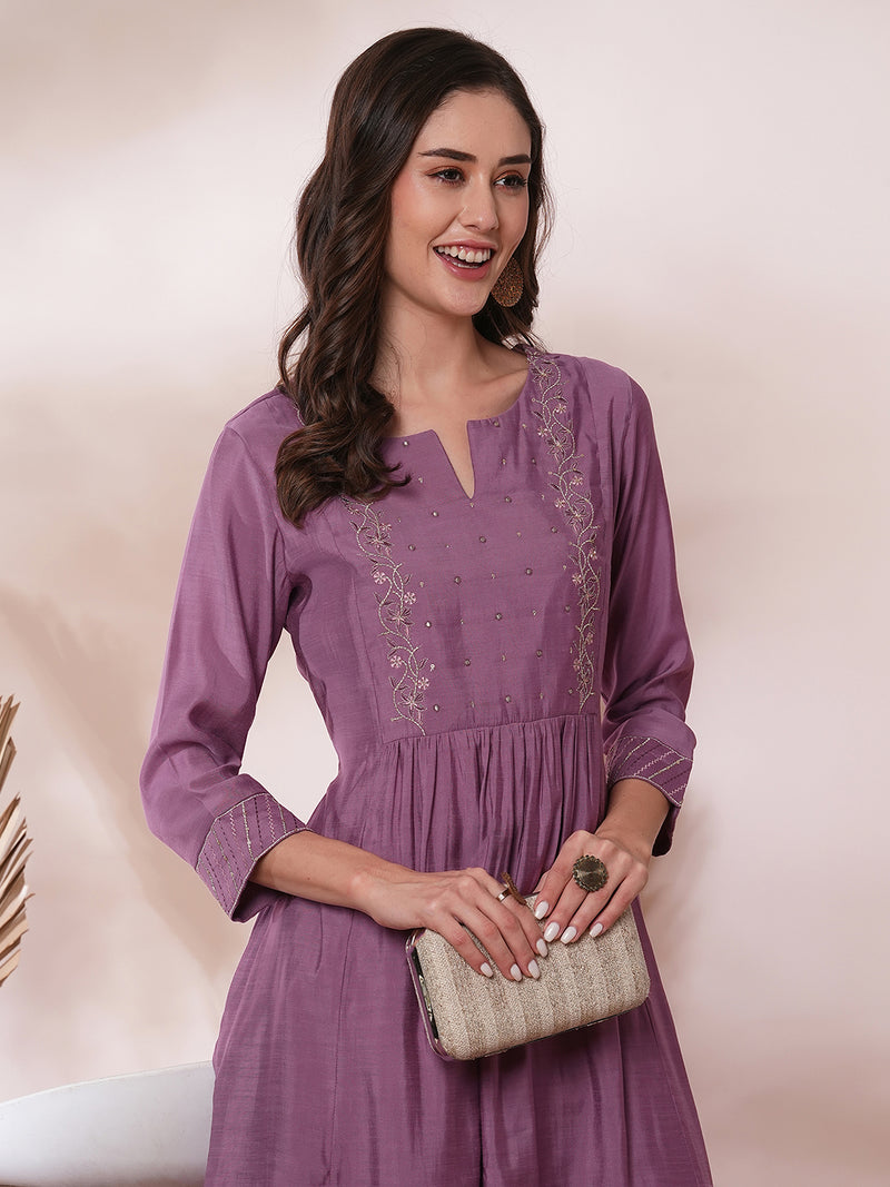 Inaara -Pocketed A line kurta adorned with zari embroidery and paired with lined silk blend pants.