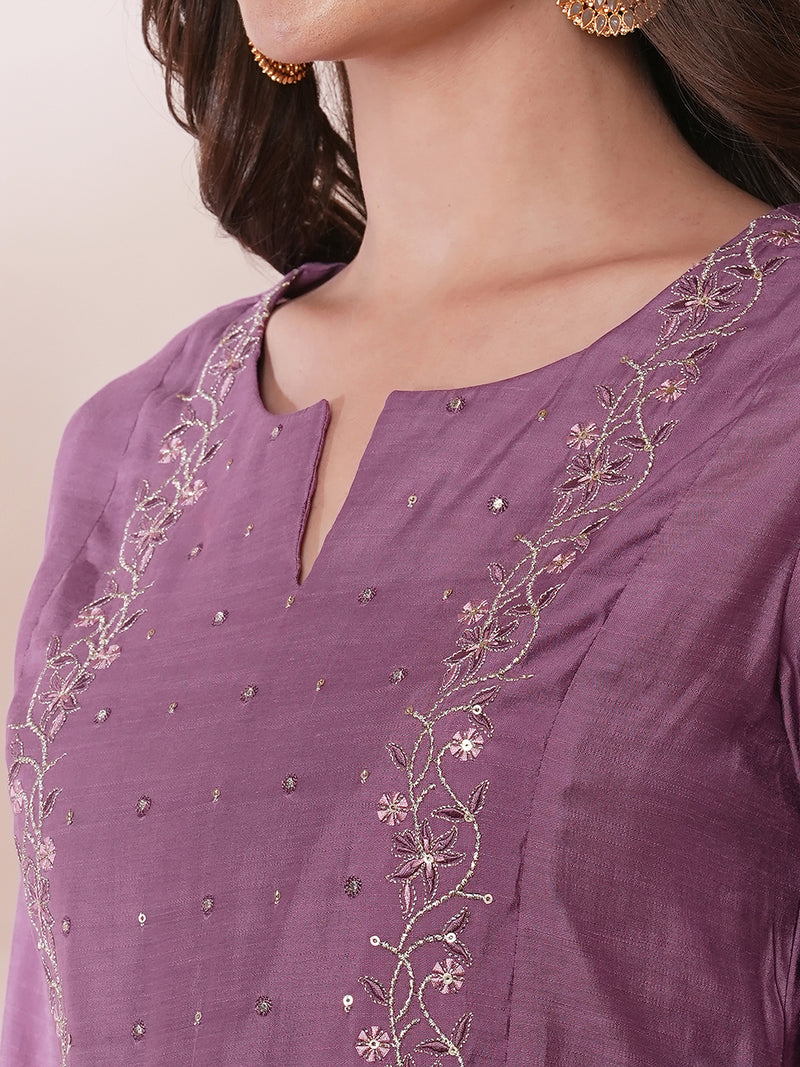 Inaara -Pocketed A line kurta adorned with zari embroidery and paired with lined silk blend pants.