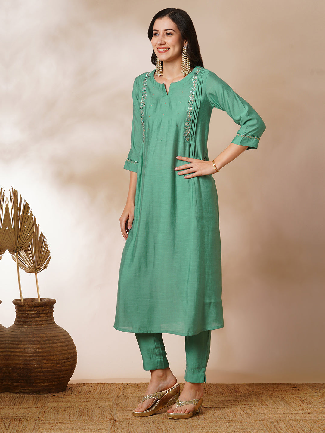 Party Edit- Pleated A-line silk blend kurta with embroidery and pocket, paired with lined silk blend pants