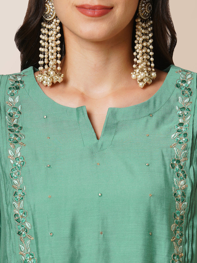 Inaara - Pleated A-line silk blend kurta with embroidery and pocket, paired with lined silk blend pants.