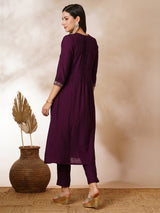 INAARA - A-line Pocketed silk blend kurta with zari embroidery and pleat detailing paired with lined pants.