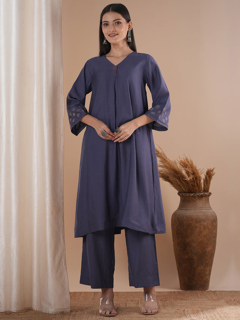 Panneled A line kurta with embroidery paired with lined palazzo in silk blend fabric