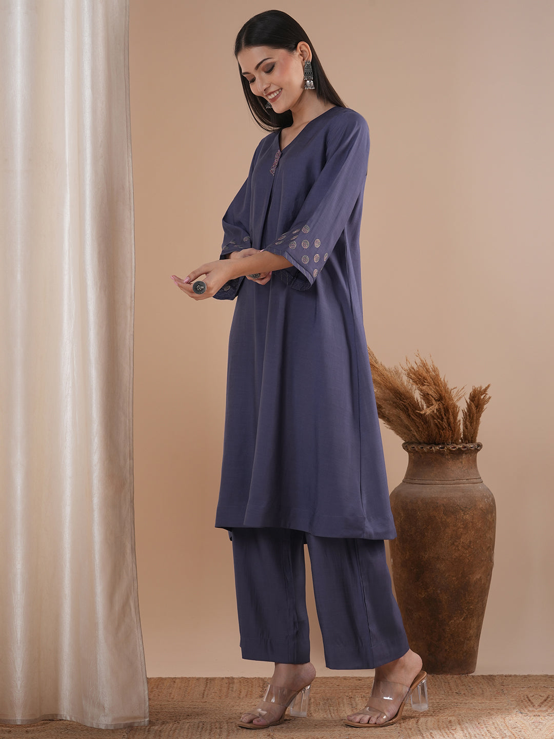 Party Edit- Paneled A line kurta with embroidery paired with lined palazzo in silk blend fabric.
