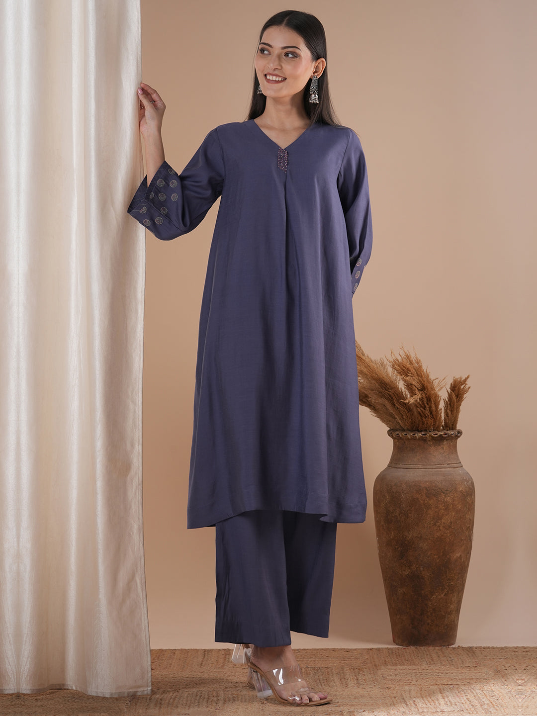 Party Edit- Paneled A line kurta with embroidery paired with lined palazzo in silk blend fabric.