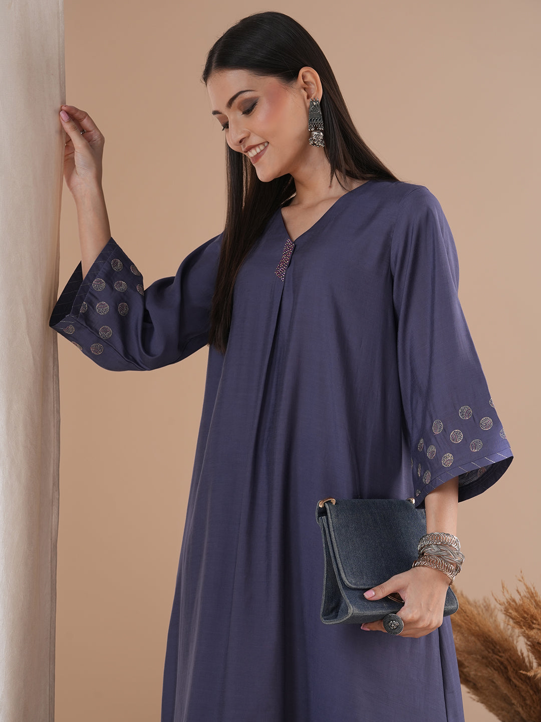 Party Edit- Paneled A line kurta with embroidery paired with lined palazzo in silk blend fabric.