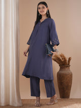 Panneled A line kurta with embroidery paired with lined palazzo in silk blend fabric
