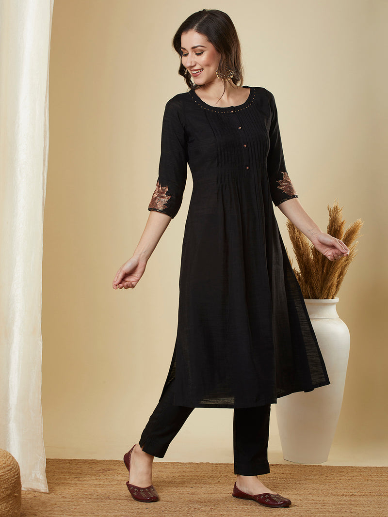 Embroidered silk blend kurta with pleating and sequin work paired with lined pants