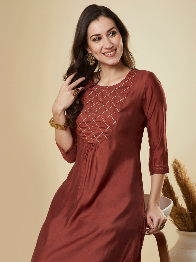 A-Line roman silk kurta set with zari embroidery with buttons on front yoke.