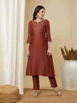 Roman silk kurta set with a triangle yoke adorned with sequins and zari work