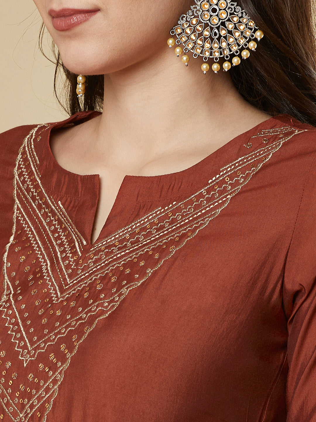 Party Edit- Roman silk kurta set with a triangle yoke adorned with sequins and zari work