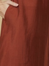Roman silk kurta set with a triangle yoke adorned with sequins and zari work