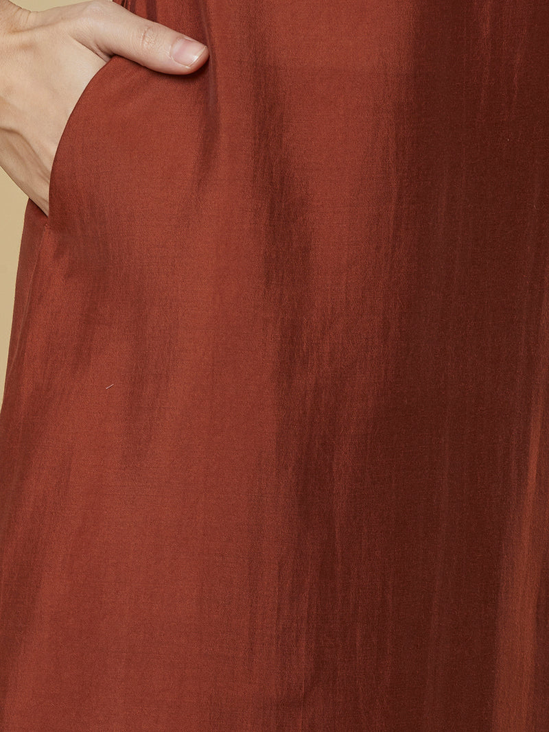 Roman silk kurta set with a triangle yoke adorned with sequins and zari work