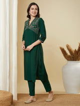 Straight alia cut kurta set with embroidered yoke and border.