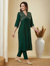 Straight alia cut kurta set with embroidered yoke and border.