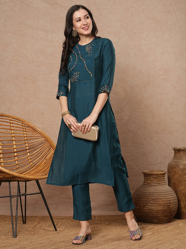 Teal blue straight fit kurta set with geometric multicolour embroidery in abstract formation yoke and cuff