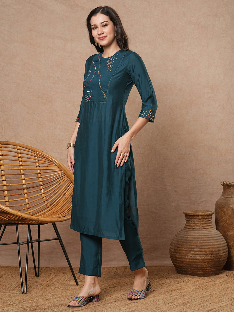Teal blue straight fit kurta set with geometric multicolour embroidery in abstract formation yoke and cuff