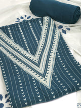 Blue unstitched suit set with contrast geometric style on the yoke with block printed dupatta.