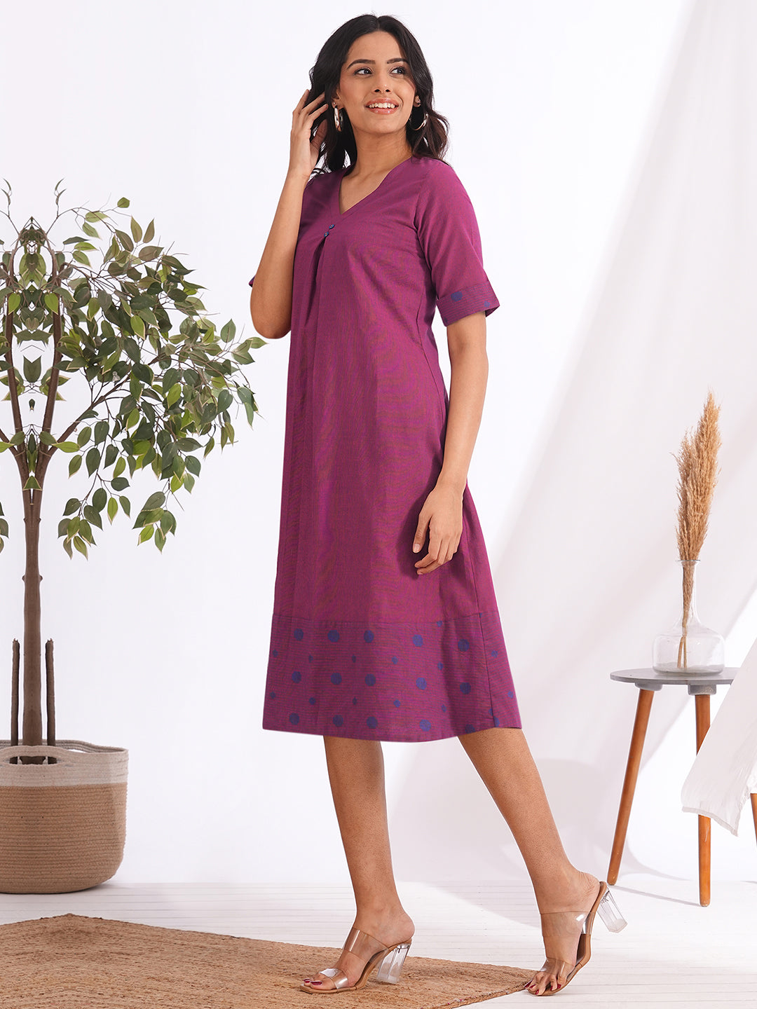 A-line dress in woven cotton stripe fabric with a centre box pleat and attached buttons