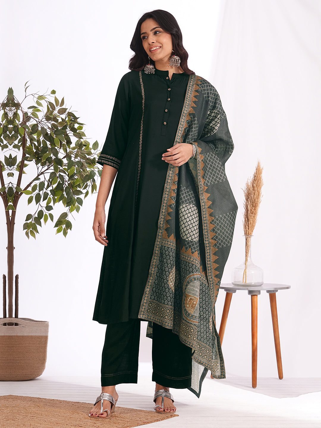 A-Line embroidered silk blend three piece set with an printed dupatta and lined palazzo.