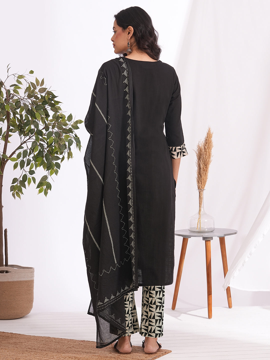 Straight fit suit set features a cotton block printed top adorned with a printed bottom & printed dupatta.