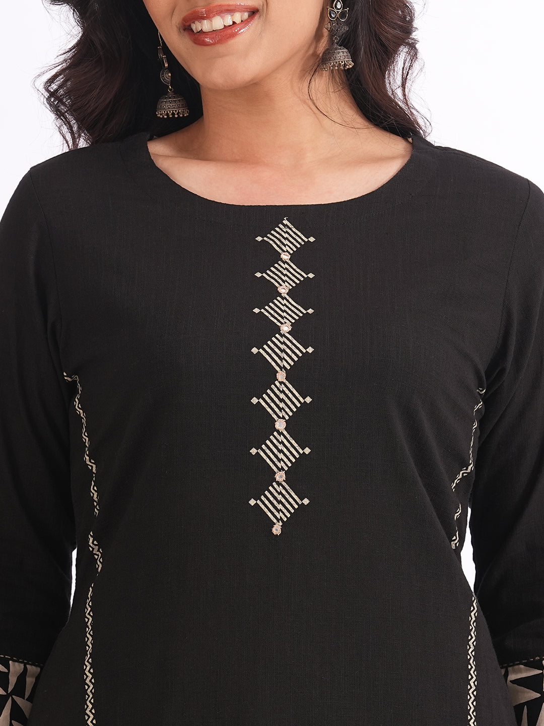 Straight fit suit set features a cotton block printed top adorned with a printed bottom & printed dupatta.